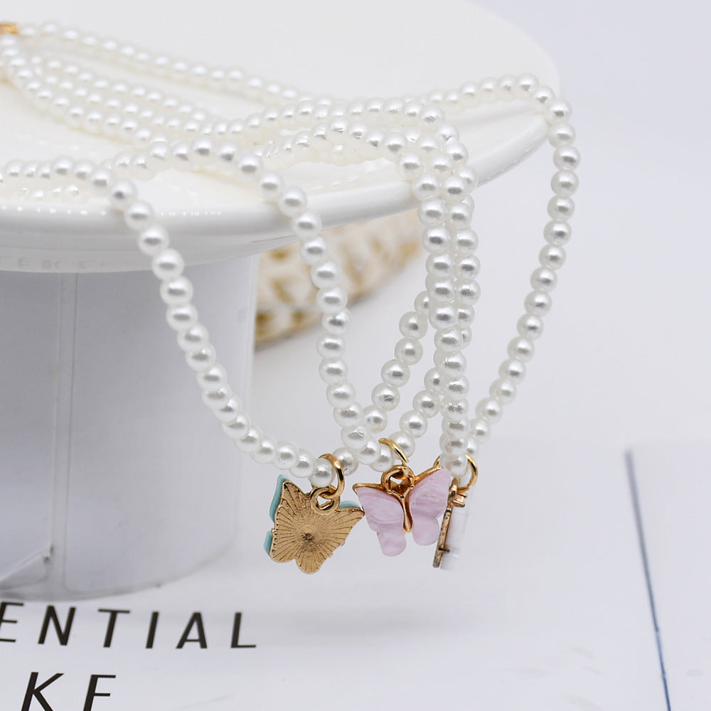 Money Magnet Pearl Butterfly Necklace – Attract Abundance in Style
